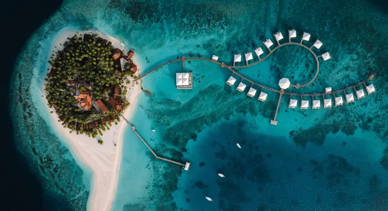 Diamonds Thudufushi Beach & Water Villas — aerial view (photo 1 of 8)